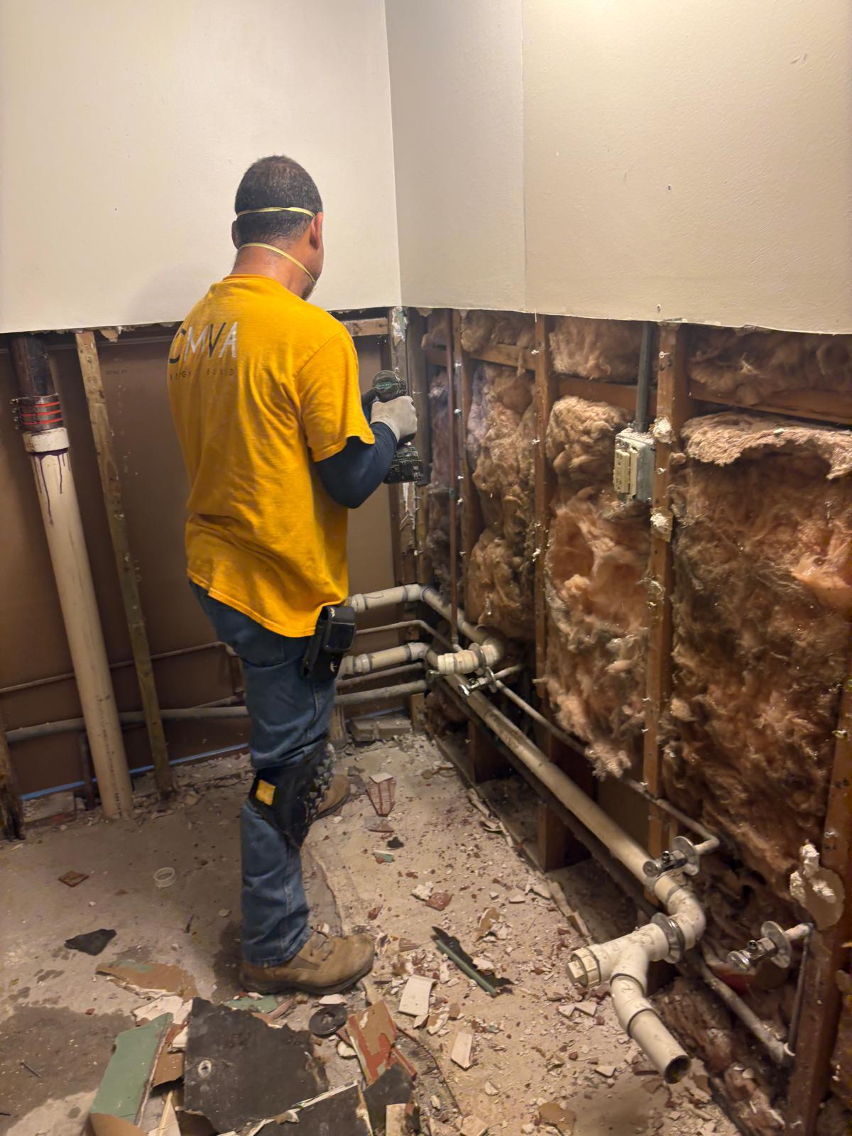 CMVA team working on plumbing